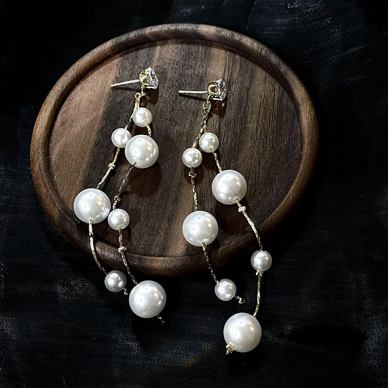 科技與時(shí)尚完美融合，最新長(cháng)款珍珠耳飾款式亮相！